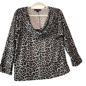 🚨Isabella Rodriguez Cheetah top Size Extra Large. P2P: 24.5” L: 23.5”